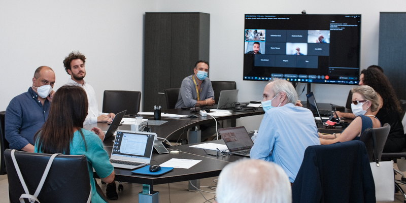 Mid-Term review meeting at Ditech building in Lecce including online participants using Webex meeting service.